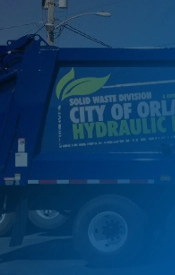 City of Orlando solid waste truck with custom fleet graphics